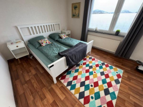 FeWo Domo46 mit Balkon, Waschmaschine & Smart TV